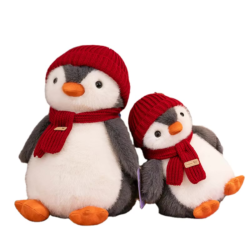 عروسک پنگوئن کلاه و شال گردن دار قرمز